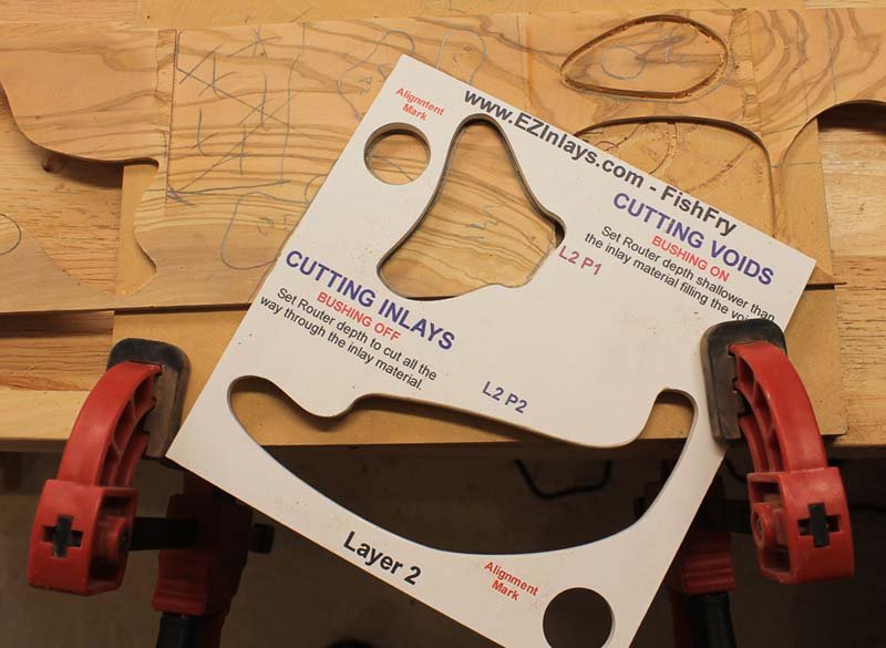 Inlay assembly and template clamped to workbench