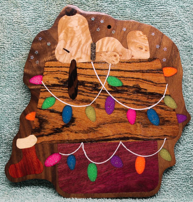 Image of the Dog Daze inlay built on Walnut with stars